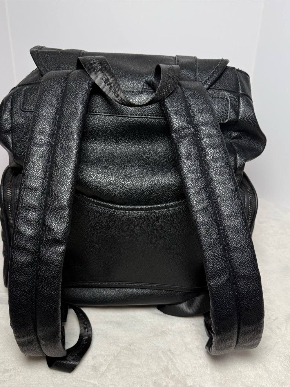 Steve Madden Black Pebbled Faux Leather Drawstring Backpack with Chain Trim - Picture 4 of 8